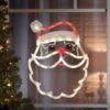 17" Lighted Santa Face Christmas Silhouette Window Decoration 1 17" Lighted Santa Face Christmas Silhouette Window Decoration -Deals AMS Store 95013 LTD STD ORN SANTA FACE IN USE